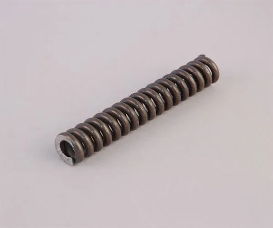 Internal spring for capping head of manual crown capper