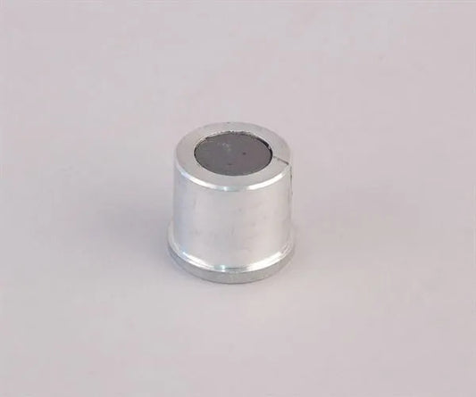 Magnet for manual crown capper