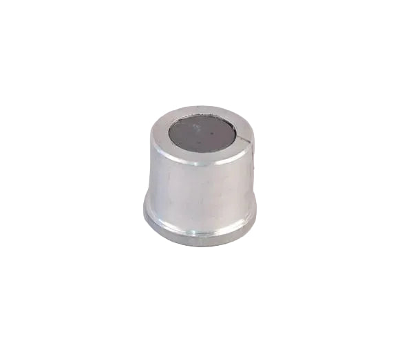 A silver-colored cylindrical magnetic piece, likely a component for a manual crown capper.