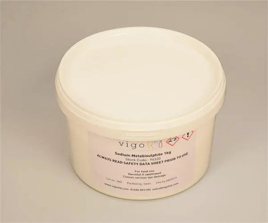 White container of Sodium Metabisulphite 1kg with a label on a beige background