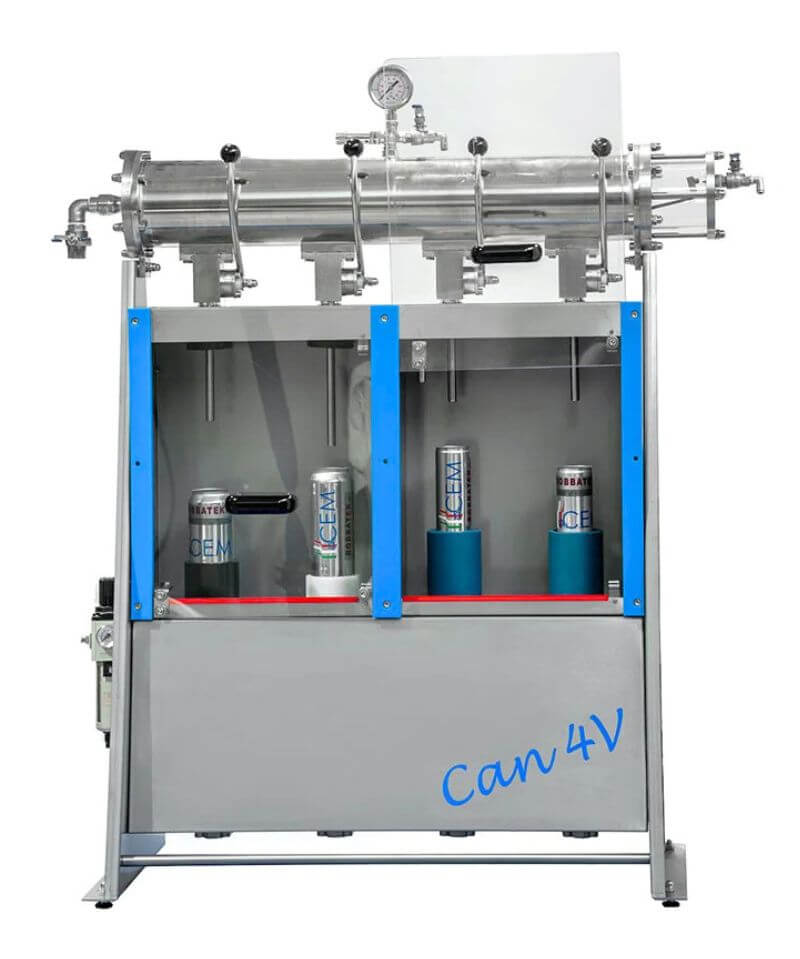 A CEM filling machine with cans on a white background