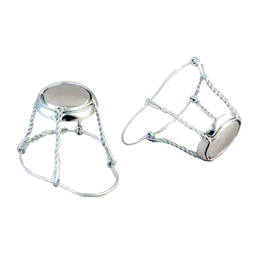 Pair of silver Champagne cages/ muselets on a white background