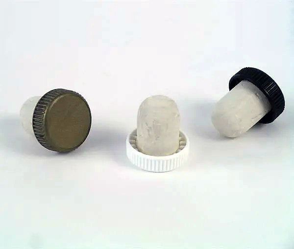 Three stopper corks for spirits in assorted colours